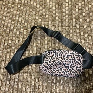 Leopard crossbody bag in new condition.